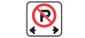 Do not park in the area between the signs. This means you may not stop your vehicle except to load or unload passengers or merchandise. (Used in pairs or groups.)