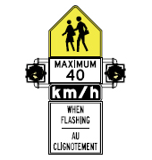 The speed limit in this zone is lower during school hours. Observe the speed limit shown when the yellow lights are flashing.