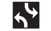 This sign, above the road or on the ground, means the lane is only for two-way left turns.