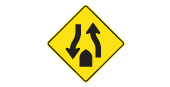 Divided highway ends: traffic travels in both directions on the same road ahead. Keep to the right-hand road