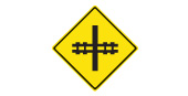 Railway crossing ahead. Be alert for trains. This sign also shows the angle at which the railway tracks cross the road