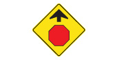 Stop sign ahead. Slow down